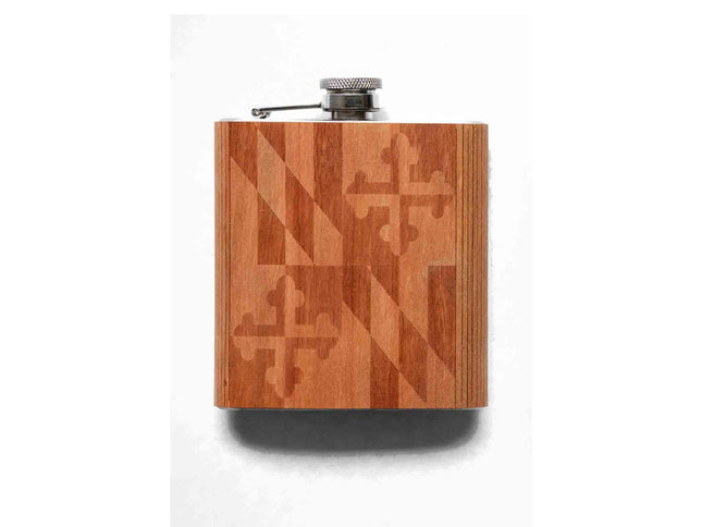 Wooden flask with geometric pattern on a white background