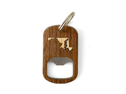 Wooden bottle opener with a cut-out design on a white background