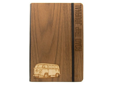 Wooden journal with a van illustration and 'Road Trip Journal' text on a white background