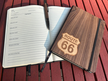Wooden notebook with 'Route 66' design on a wooden surface