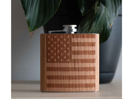 Wooden flask with American flag design on a neutral background