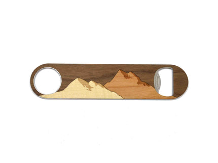 Wooden bottle opener with mountain design on a white background