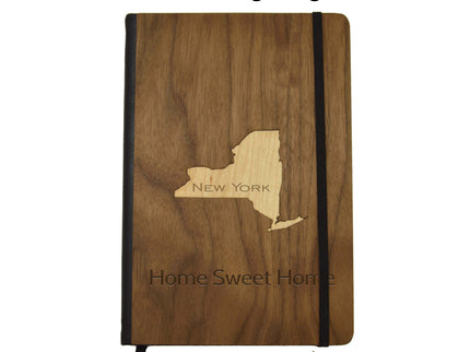 Wooden notebook with New York state engraving and 'Home Sweet Home' text on a white background