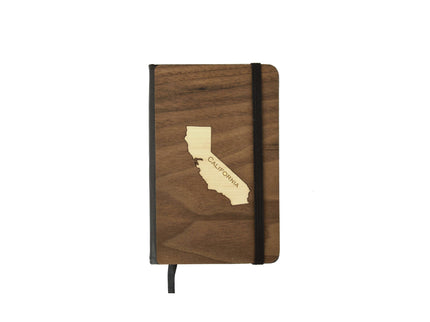 Wooden notebook with California outline design on a white background