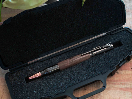 Autumn Woods Black Walnut Bolt Action Pen resting inside the Hard Black Pen Case