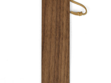 Wood bookmark with leather loop against white background