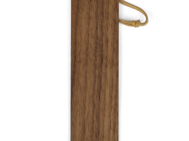 Wood bookmark with leather loop against white background