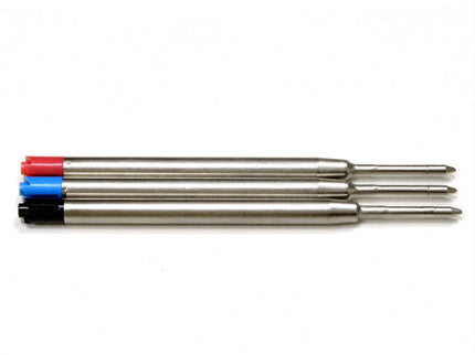 A set of three Parker pen refills, with red and blue caps, lying on a white surface.